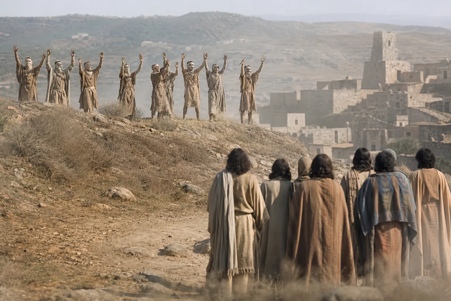 Ten lepers standing afar off crying out to Jesus for mercy on the border of Samaria and Galilee